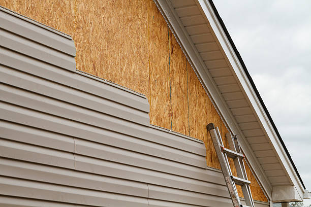 Professional Siding Repair technician working in Parkville, PA